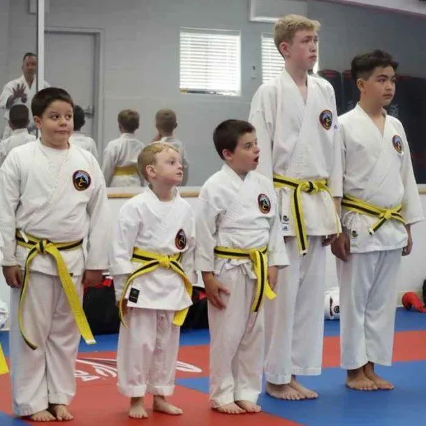 Adult and child training together in family karate class